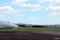  - A shot looking southeast across the airfield at Dundee Riverside airport (EGPN). Located on the north bank of the River Tay, the Tay Rail Bridge is visible in the background. - by Clive Pattle