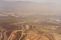  @ Q59 - Fremont,Ca closed in 1986.Most pilots who flew out of Fremont and there were many, will find this picture a familiar sight. It is on the 45 entry to runway 31 and over the landfill. Over the dumps, was an often heard unicom call.View is to the east. - by S B J