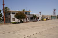  - Red Bluff airport with ramp view of airport office and nice upstairs restaurant. The restaurant is a nice place to watch planes  land in the sometimes tricky Red Bluff winds. - by S B J