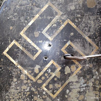  - A close-up of the tail markings of an unidentified Heinkel HE-111 on display at the IWM Duxford showing not only the swastika marking but water damage after a period submerged and recovered from Storvatnet Lake, Norway in 1974. - by Clive Pattle