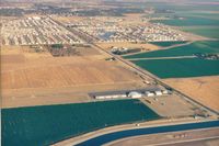  @ PATT - Patterson airport in Patterson,Calif. A private Ag airport that is being over run by development.Closed as of 2014.Homes are much closer then when this picture was taken.View is east. - by S B J