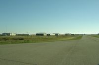  - View to the south at the end of runway 15 at Orland airport.. - by S B J