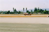  - Aeronca L3 and Cessna 210.If it is a  race, my money is on the 210, but off frist ??? Both in position for departure from the Watsonville Flyin in Calif. - by S B J