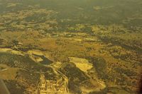  - Old Calaveras Co airport closed early 80s. Seen directly above closed cement plant and right of San Andreas.Many foothills located airports are hard to locate frist time.Landed there many times and was a favorite.View NE. - by S B J