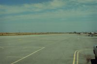  - View one would have taxiing out from the west side to runway 30. Did this for several years in the 80s. View is to the south. Other then the summertime crosswinds,San Carlos was a nice airport and in the mid 80s had some good tower people. - by S B J