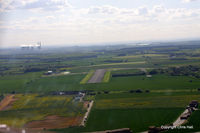  - on finals to RW27, 820 mtrs long - by Chris Hall