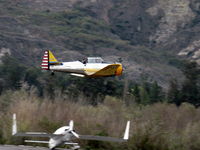  - Condor Squadron high speed flour bomb run at riverbed target, Commemorating 7 Dec. 1941 attack on Pearl Harbor. - by Doug Robertson