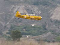  - Condor Squadron high speed flour bomb run at riverbed target, Commemorating 7 Dec. 1941 attack on Pearl Harbor. Bombardier always operating from back seat, making multiple passes/drops.  - by Doug Robertson
