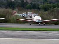  - Condor Squadron making another (very low) high speed flour bombing pass at riverbed target Commemorating 7 Dec. 1941 attack on Pearl Harbor. Each aircraft made multiple passes/drops to be scored. - by Doug Robertson