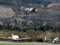  - Condor Squadron making another high speed pass flour bombing the riverbed target Commemorating the 7 Dec. 1941 attack on Pearl Harbor. - by Doug Robertson