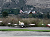  - Condor Squadron making another high speed flour bombing pass at the Santa Clara River-bed target Commemorating the 7 Dec. 1941 attack on Pearl Harbor - by Doug Robertson