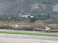  - Condor Squadron making high speed pass at flour bombing target in Santa Clara River-bed Commemorating the attack of 7 Dec. 1941 on Pearl harbor. Excuse this grab shot; unprepared for the setup. - by Doug Robertson