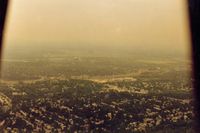  - Akron Fulton airport seen in the distance as Chief 68E flys over Akron,Ohio to the west and back to California.. - by S B J