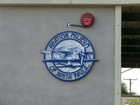  - Aviation Museum of Santa Paula-marking Museum Hangar Office, Sales room, Toilets & Display, just off airport entry parking lot. - by Doug Robertson