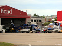  - One of two hangars of Bond Helicopters Ltd at Aberdeen, Scotland EGPD - by Clive Pattle