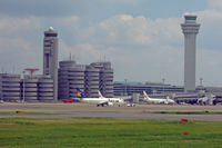  - Bulky buildings and two towers at Haneda - by Micha Lueck