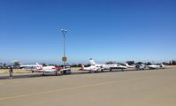  - A packed transient parking at Reid Hillview Airport, CA. The PC 12 was supposed to go to transient but there were no spots available for it!   - by Chris Leipelt