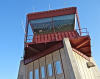  - The control tower watching over Reid Hillview Airport, CA during a summer sunset. - by Chris Leipelt