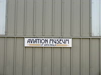  - Main Hangar Sign of Aviation Museum of Santa Paula, on closed bi-fold doors. - by Doug Robertson
