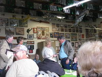  - Pat Quinn's Bucker Museum Hangar luncheon party on the occasion of his receiving the FAA Master Pilot Award for 50 years accident free-no violations flying. Proud Arlys and Pat at the award ceremony. - by Doug Robertson