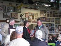  - Pat Quinn Bucker Museum celebration party on the occasion of his receiving the FAA Master Pilot Award for 50 years accident free flying-no violations award, proud Host Pat with conferring officials. - by Doug Robertson