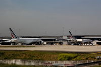  - After a right turn another of (felt one thousend) CDG aprons came in sight and offered the first A380 today..... - by Holger Zengler