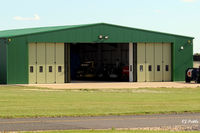  - A hangar at Leicester EGBG containing helicopters - by Clive Pattle
