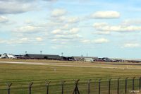  - Airfield view RAF Coningsby EGXC - viewed from the south side, the 29 (R) Sqn hangar and buildings. The 'Gate Guard' English Electric Lightning can be seen mid image.  - by Clive Pattle