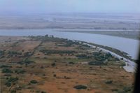  - Bob Ried  strip (private) near Rio Vista,Ca. It is seen in the middle of pic in 1973.It is where I learned that a 65 Tcraft does not get off like a 150 Cub due to short strip and high grass.Very near a NTSB statistic that day!! View is west. - by S B J