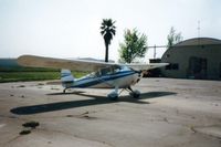  @ William Robert Johnston Municipal Airport - N9078E in front of what must have been the FBO at one time.You can tell by the front door,they are no longer open.Was able to buy gas there in the 80s,but that too is long gone. - by S B J