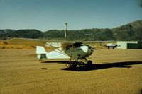  - N9078E at lovely Bridgeport airport. The bike was used to bring fuel from town when I was able to use auto gas. - by S B J