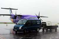  - Ramp activity at a very wet and overcast Dundee Riverside Airport EGPN - by Clive Pattle