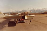  - 59X at Bridgeport,Ca offloading its own ground transportation.The little Honda allowed me to visit Bodie State Historic Park (a must see) 12 miles away, but at over 8K feet.Notice windsock which was a direct crosswind this day. - by S B J