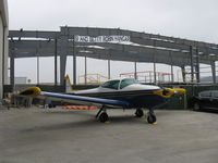  - New EAA Chapter 723 large Hangar in build named after major donors, adjacent CAF hangars on site of EAA Chapter 723 much smaller removed hangars. N8600H in foreground. - by Doug Robertson