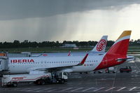  - View on two aircrafts and a curtain of rain.... - by Holger Zengler