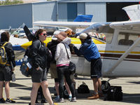  - 2014 Air Race Classic judges, pilots and ground crews checking out a new arrival for the race @ Buchanan Field, Concord, CA - by Steve Nation