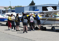  - 2014 Air Race Classic judges, pilots and ground crews checking out a new arrival for the race @ Buchanan Field, Concord, CA - by Steve Nation