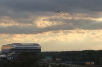  - View from a window at MEININGERs on inbound traffic for northern runway and on Frankfurt Airport railway station building... - by Holger Zengler