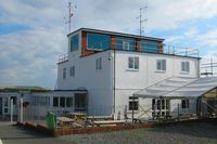  - Renovation of the outside of the main airport building almost finished. - by Roger Winser