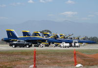 - Five Blue Angels F/A-18C Hornets single seat with one F/A-18D Hornet dual seat (Tail #7) aligned on display-practice day for the weekend airshow at NTD. Two General Electric F404-GE-402 turbofans. Max speed Mach 1.8 - by Doug Robertson