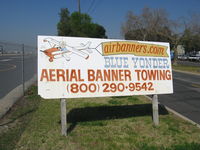  - Blue Yonder Banner Towing company's sign at airport entrance - by Steve Nation