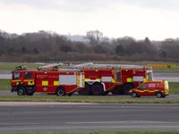  - some of airport fire service on standby, - by Jez-UK