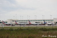  - Southwest Florida International Airport terminal as seen from across the runway complex - by Donten Photography