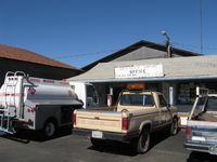  - Santa Paula Airport Utility trucks, at office. Tanker truck is for helicopter refueling. - by Doug Robertson