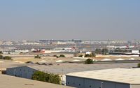  - Overview of the nothern side of DXB. From left to right you see a passenger terminal, freight terminal, GA terminal maintance area. - by FerryPNL