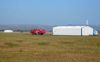  - Fire and Rescue Tender No 2 and hangars. - by Roger Winser