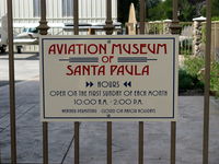  - Entry sign from parking lot for the Aviation Museum of Santa Paula adjacent. - by Doug Robertson