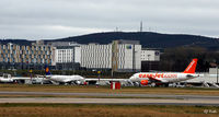  - West side of airport and terminal showing mass of new hotels and industrial buildings - at Aberdeen EGPD - by Clive Pattle