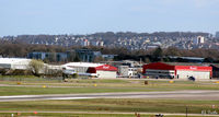  - Bond Helicopters hangars at Aberdeen EGPD - with GA park on left of apron. - by Clive Pattle