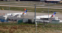  - Two SAS CRJ-900LR's occupy the gates at Aberdeen EGPD - on flights from Stavanger and Copenhagen. - by Clive Pattle